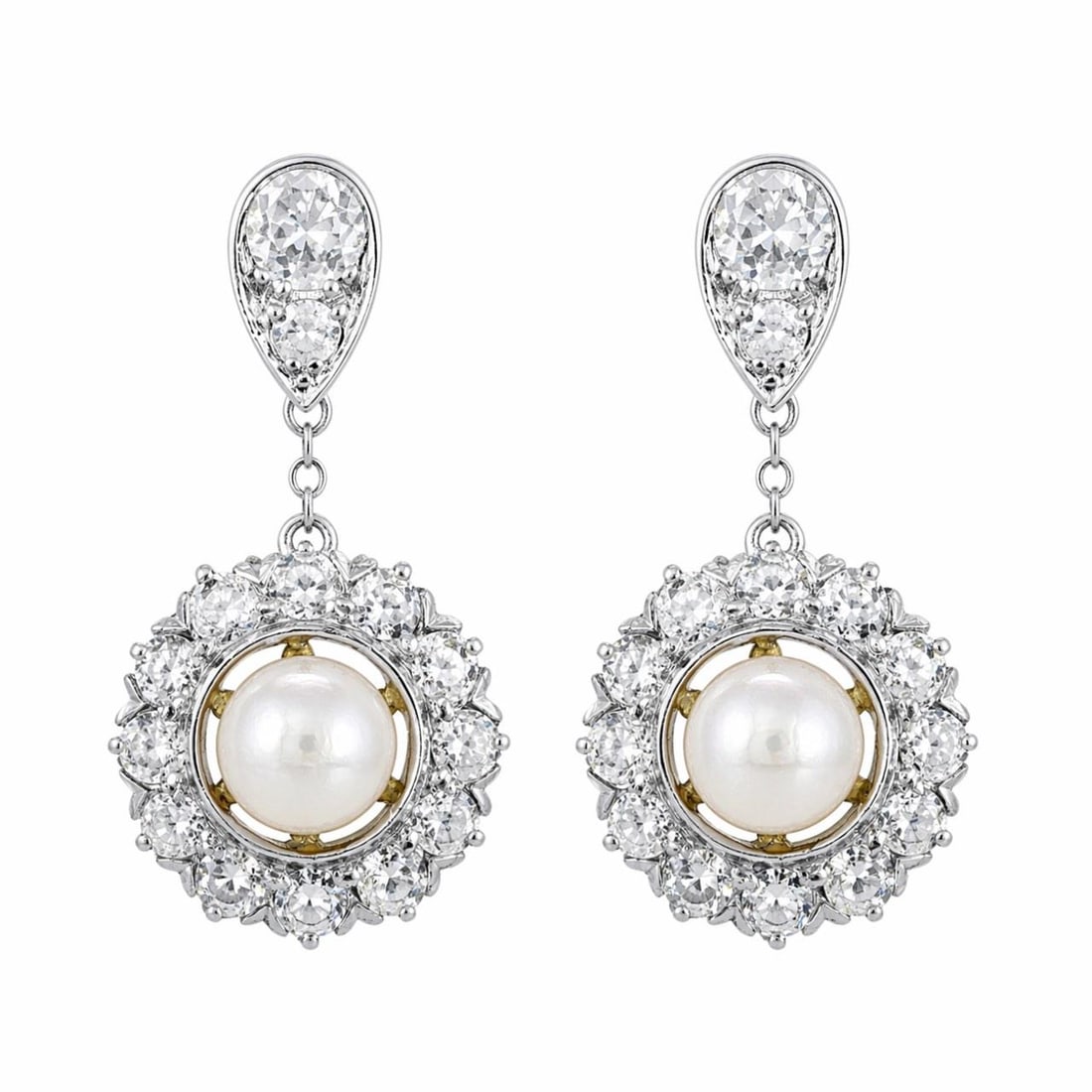 Antique Pearl and Diamond Earrings in 18K Gold and Platinum Victorian Era: Antique Pearl and Diamond Earrings in 18K Gold and Platinum Victorian Era Victorian earrings crafted from 18K yellow gold and platinum, featuring two natural pearls and 28 old mine cut diamonds with a