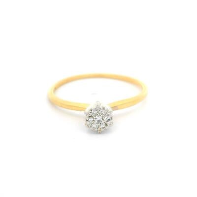 14k Yellow Gold Diamond Cluster Ring 0.10ctw Size 7.5: 14k Yellow Gold Diamond Cluster Ring 0.10ctw Size 7.5 This petite engagement ring features a cluster of seven natural single cut diamonds with a total approximate weight of 0.10 carats, set in a pave 