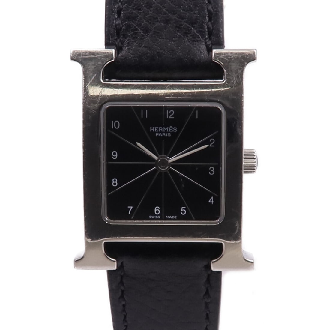 Hermes HH1.210 Black Dial Quartz Stainless Steel and Leather Wristwatch: Hermes HH1.210 Black Dial Quartz Stainless Steel and Leather Wristwatch This Hermes H Watch HH1.210 features a stainless steel case paired with a black dial and black frame. The watch is powered by a 