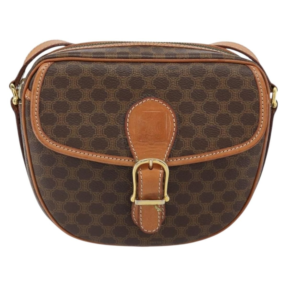 Vintage Macadam Canvas and Leather Shoulder Bag by Celine: Vintage Macadam Canvas and Leather Shoulder Bag by Celine This vintage Celine Macadam shoulder bag for women features a brown canvas body with leather accents. It measures 19cm x 15cm x 6cm and is mad