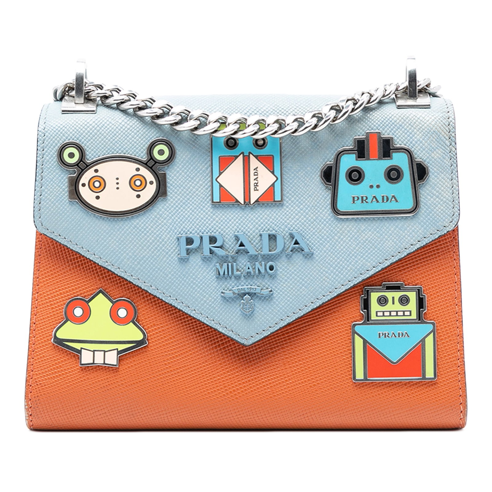 Prada Saffiano Leather Crossbody Bag with Robot Appliques and Chain Strap: Prada Saffiano Leather Crossbody Bag with Robot Appliques and Chain Strap This Prada Bicolor Saffiano Cuir Monochrome Robot Patches Envelope Chain Flap is a crossbody bag crafted from saffiano leather