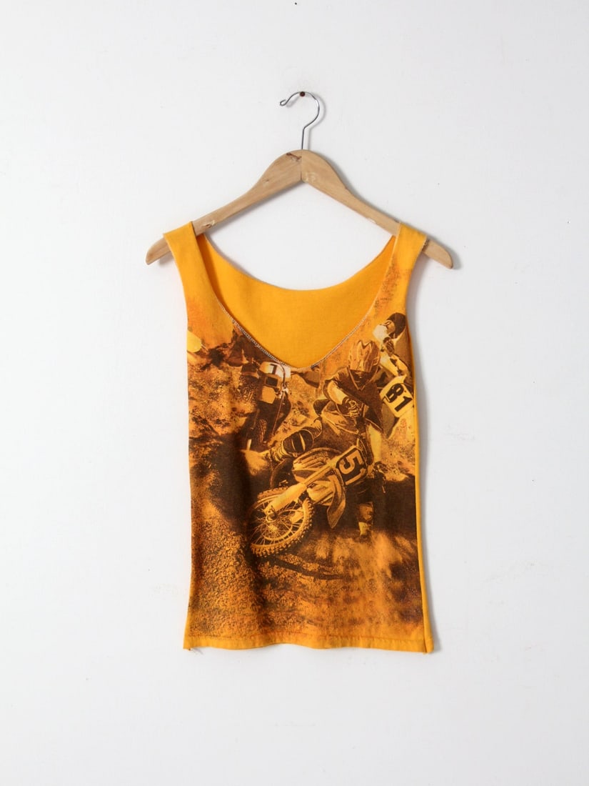 Vintage Motor Bike Graphic Scoop Neck Tank Top S: Vintage Motor Bike Graphic Scoop Neck Tank Top S This vintage re-cut tee tank showcases a striking motor bike graphic prominently displayed across the front. The tank features a stylish scoop neck and