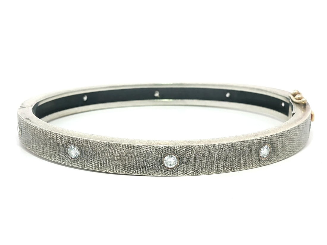 Rene Escobar 18k Rose Gold Diamond Hinged Bangle Bracelet: Rene Escobar 18k Rose Gold Diamond Hinged Bangle Bracelet This exquisite hinged bangle bracelet showcases a stunning combination of solid sterling silver and 18k rose gold, adorned with ten natural br