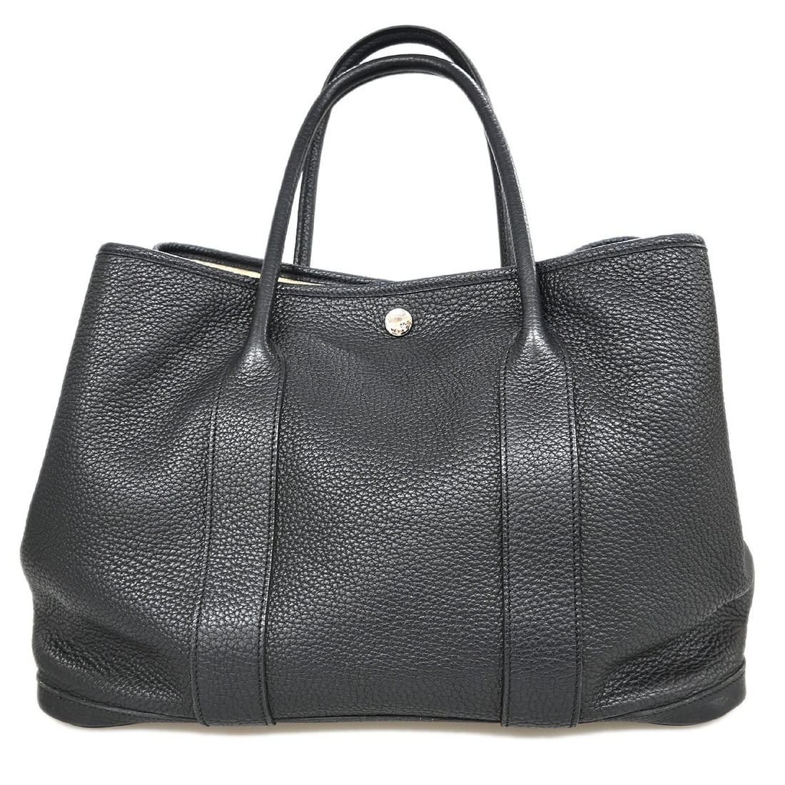 Garden Party 36 PM Tote in Black Negonda Leather with Silver Hardware: Garden Party 36 PM Tote in Black Negonda Leather with Silver Hardware This Hermes Garden Party 36 PM tote handbag features a black Negonda exterior with double handles and silver-tone hardware. Design