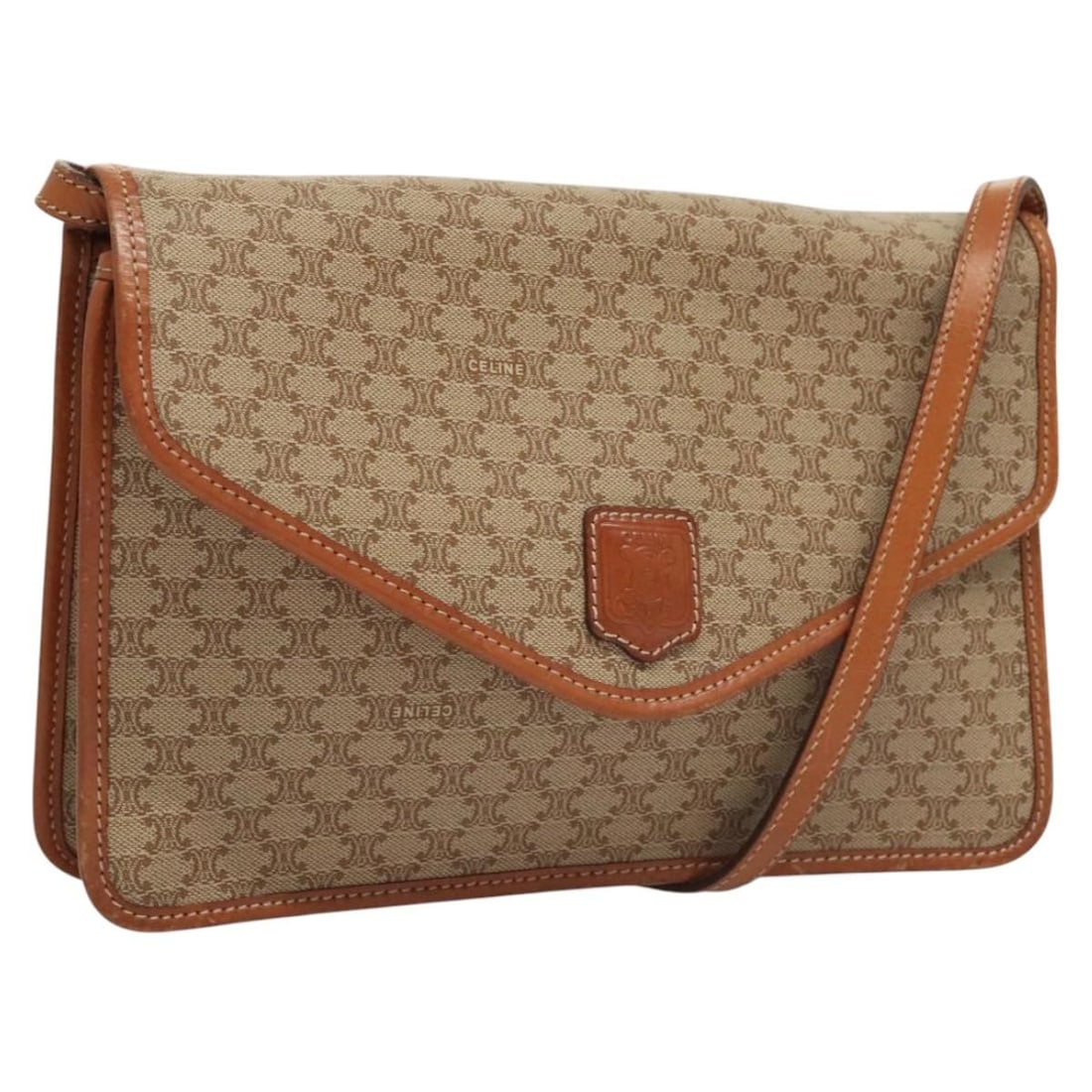 Celine Macadam Beige Canvas and Leather Vintage Shoulder Bag: Celine Macadam Beige Canvas and Leather Vintage Shoulder Bag This Celine Vintage Macadam Shoulder Bag features a beige canvas body with leather accents. Designed for women, the bag shows signs of gent