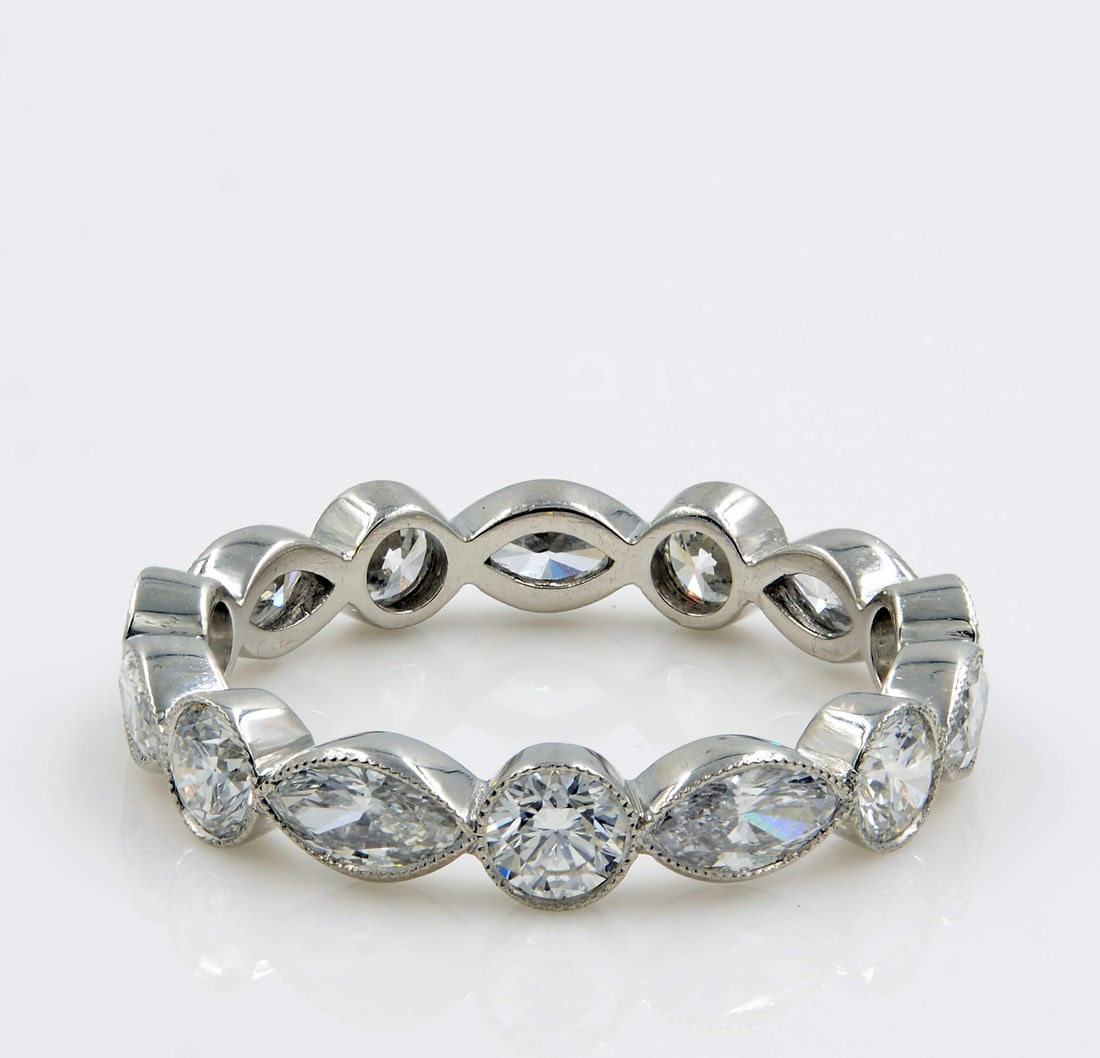 Rachel Koen 1.75ct Platinum Eternity Band with Marquise and Round Diamonds: Rachel Koen 1.75ct Platinum Eternity Band with Marquise and Round Diamonds This exquisite eternity band features 1.75 carats of brilliant marquise and round diamonds, each snugly set in a luxurious pl