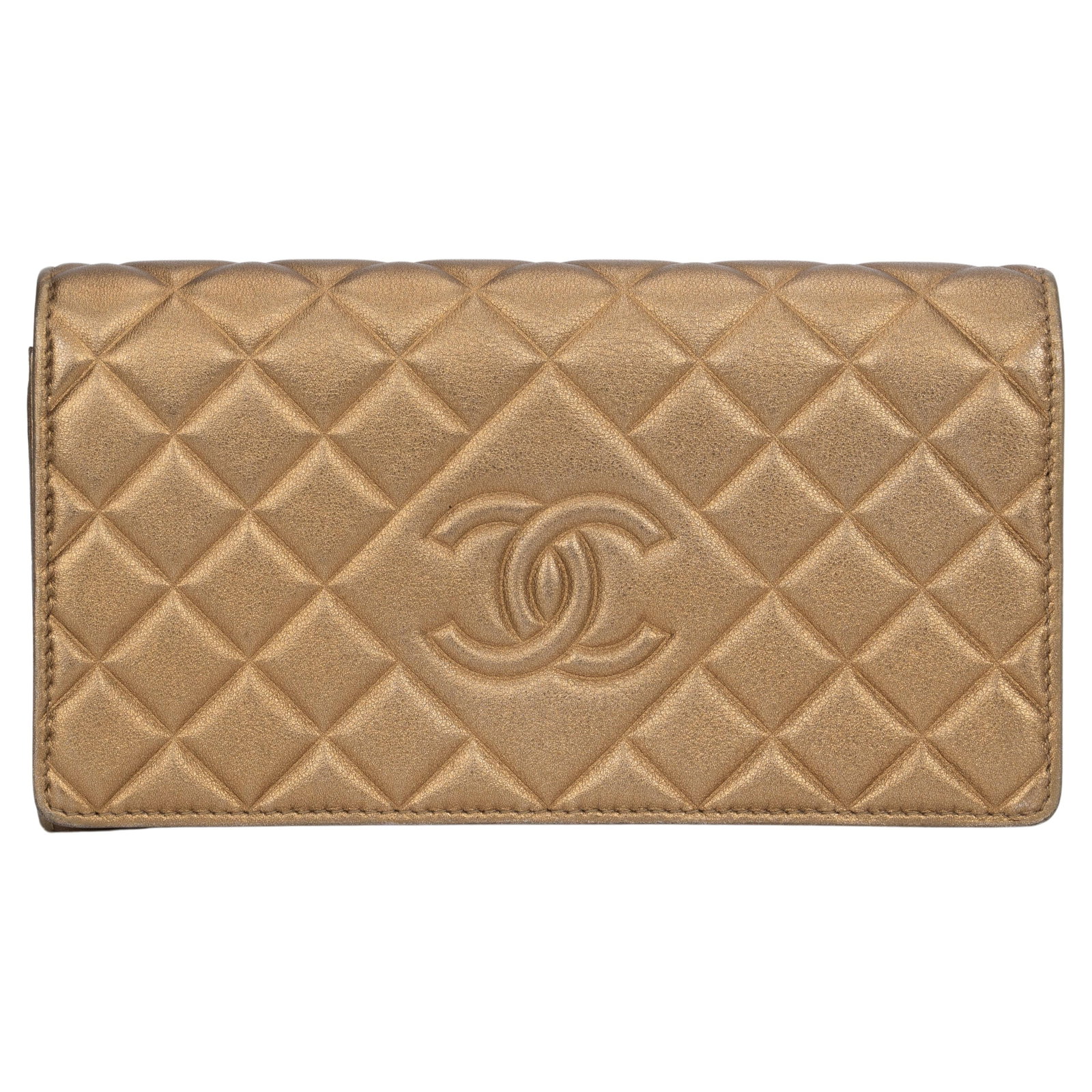Chanel Bronze Leather Quilted Large Flap Wallet with Hologram: Chanel Bronze Leather Quilted Large Flap Wallet with Hologram Introducing the Chanel Bronze Quilted Large Flap Wallet, a luxurious accessory that combines style and functionality. Crafted from exquisi