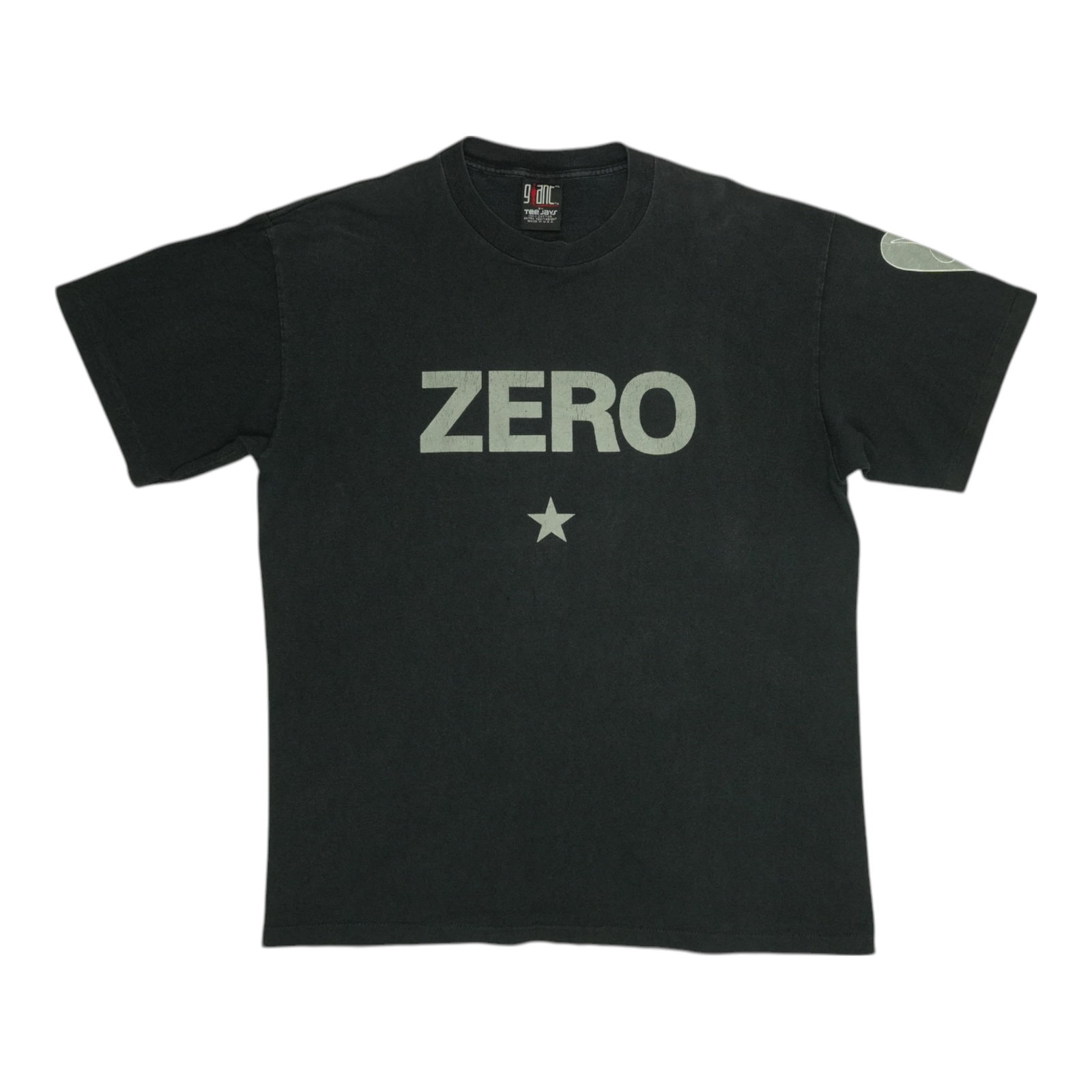Vintage 1990s Smashing Pumpkins Zero Black Cotton Band T-Shirt: Vintage 1990s Smashing Pumpkins Zero Black Cotton Band T-Shirt This is an original vintage 1990s Smashing Pumpkins "Zero" shirt, featuring a black color and constructed from 100% cotton. It is a true 