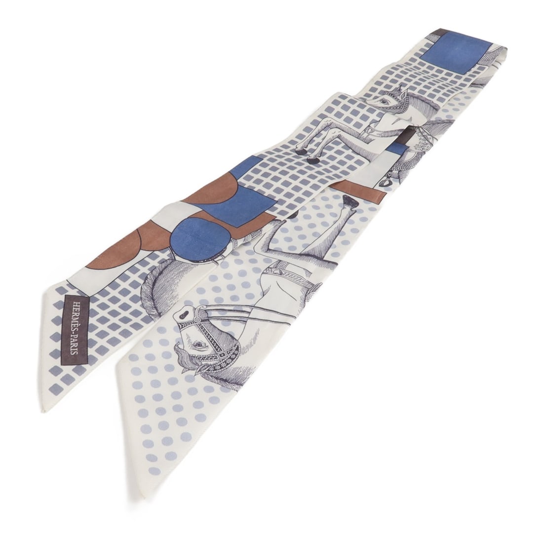 Hermes silk Twilly scarf in white and gray: Hermes silk Twilly scarf in white and gray This Hermes Twilly scarf is crafted from luxurious silk and features a sophisticated white and gray color palette. Designed for women, it offers a versatile 