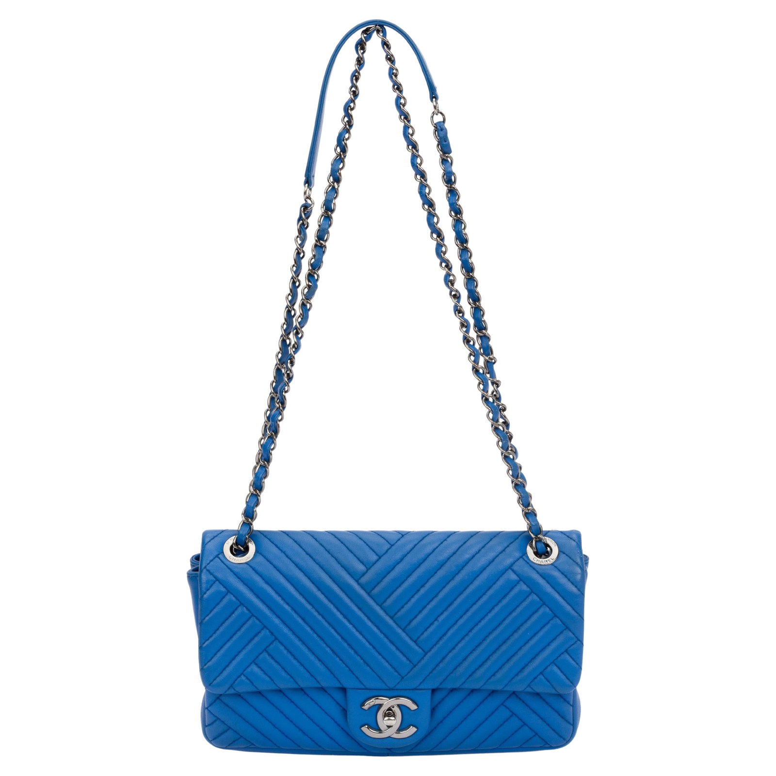 Chanel Blue Izmir Quilted Leather Flap Bag with Silver Hardware: Chanel Blue Izmir Quilted Leather Flap Bag with Silver Hardware This exquisite Chanel Blue Izmir Single Quilted Flap bag is a timeless piece from the 21st Century collection. Crafted in Italy from hig