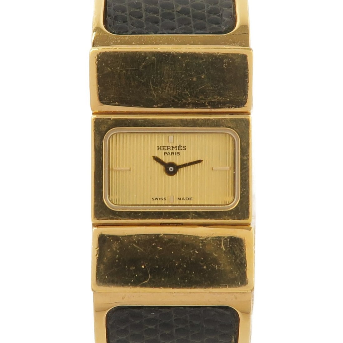 Hermes Loquet L01.201 Gold Plated Quartz Women's Wristwatch: Hermes Loquet L01.201 Gold Plated Quartz Women's Wristwatch This HERMES Loquet L01.201 wristwatch features a gold-plated case and a striking gold dial, complemented by a gold-plated band with lizard l