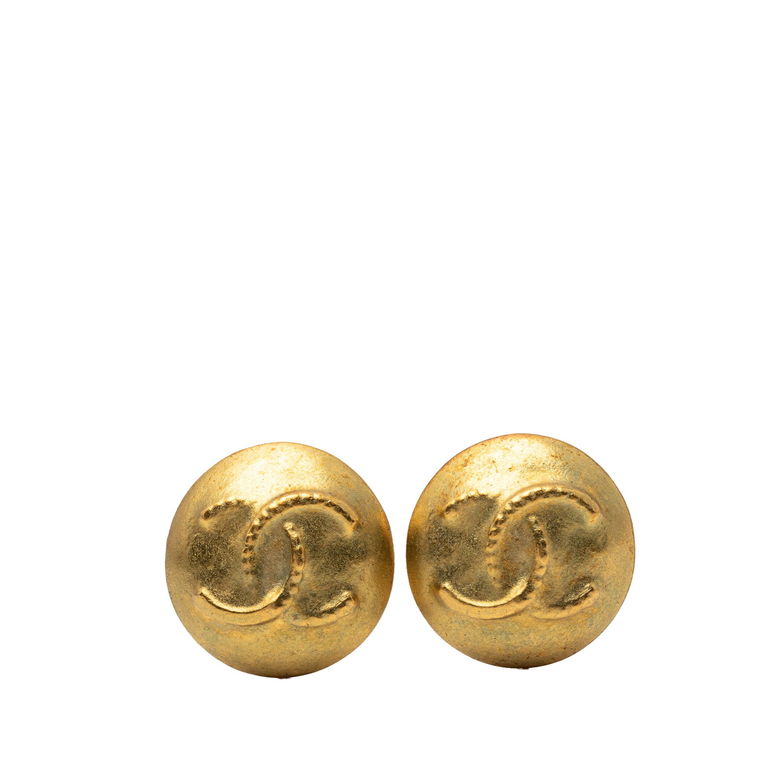 Chanel CC Logo Gold Plated Metal Clip On Button Earrings: Chanel CC Logo Gold Plated Metal Clip On Button Earrings These Chanel CC button earrings feature gold plated metal bodies and clip-on closures. Designed as costume jewelry, they showcase the iconic CC