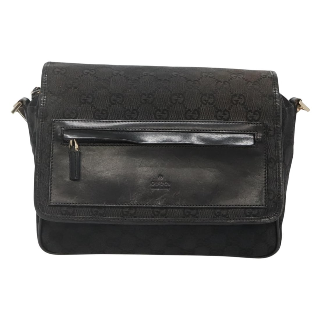 Black Gucci Canvas Crossbody Flap Messenger Bag 25cm: Black Gucci Canvas Crossbody Flap Messenger Bag 25cm This Gucci Flap Messenger Bag features the brand's signature GG coated canvas in black, designed as a unisex accessory. It offers a compact and pra