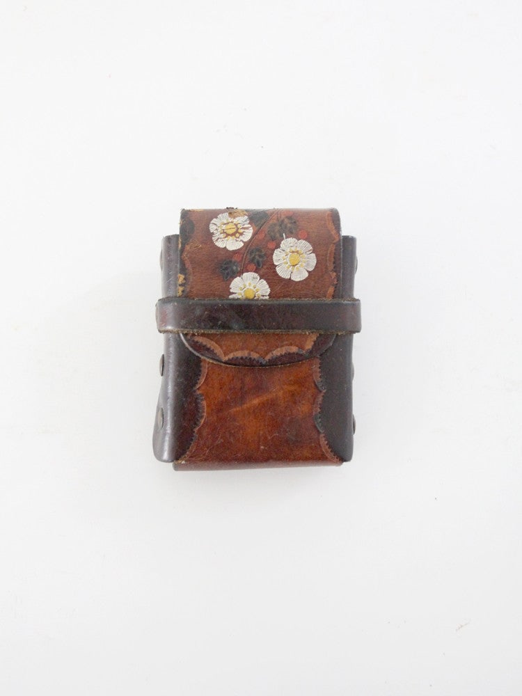 1970s Vintage Tooled Leather Belt Pouch with Floral Motif: 1970s Vintage Tooled Leather Belt Pouch with Floral Motif Discover a unique piece from the 1970s with this vintage tooled leather belt pouch. Crafted from thick brown leather, it showcases a hand-tool