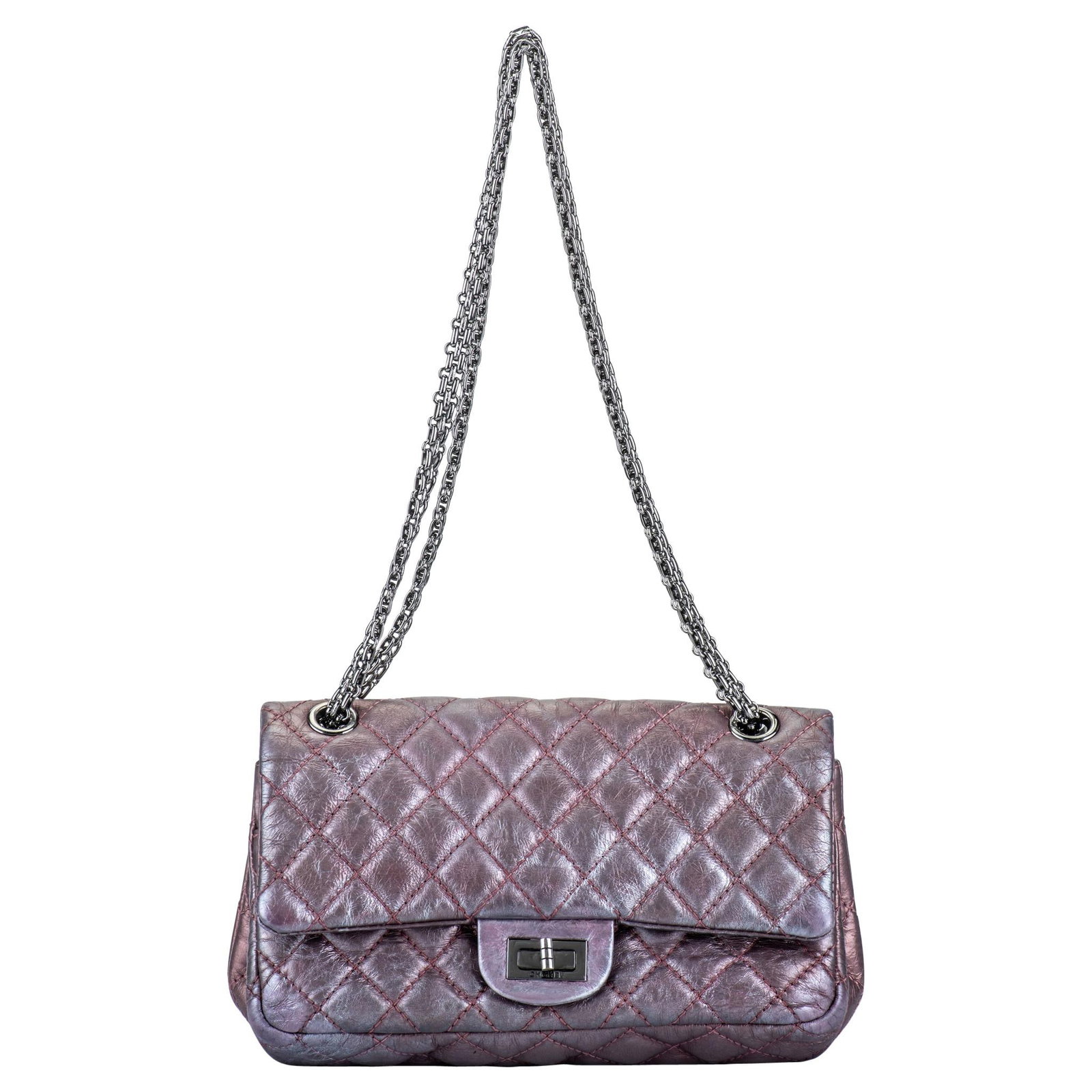 Chanel Lavender Metallic Reissue Flap Bag with Hologram: Chanel Lavender Metallic Reissue Flap Bag with Hologram Elevate your style with this stunning Chanel Metallic Lavender Reissue Flap Bag, a must-have accessory for any fashion enthusiast. Crafted from 