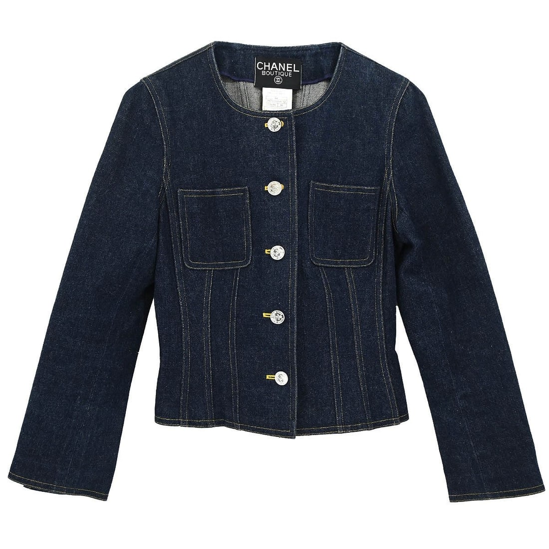Indigo Denim Collarless Jacket by Chanel Size 36 Vintage 96P: Indigo Denim Collarless Jacket by Chanel Size 36 Vintage 96P This vintage Chanel jacket features a collarless, single-breasted design in indigo denim. Crafted from 100% cotton, it offers a mid-length 