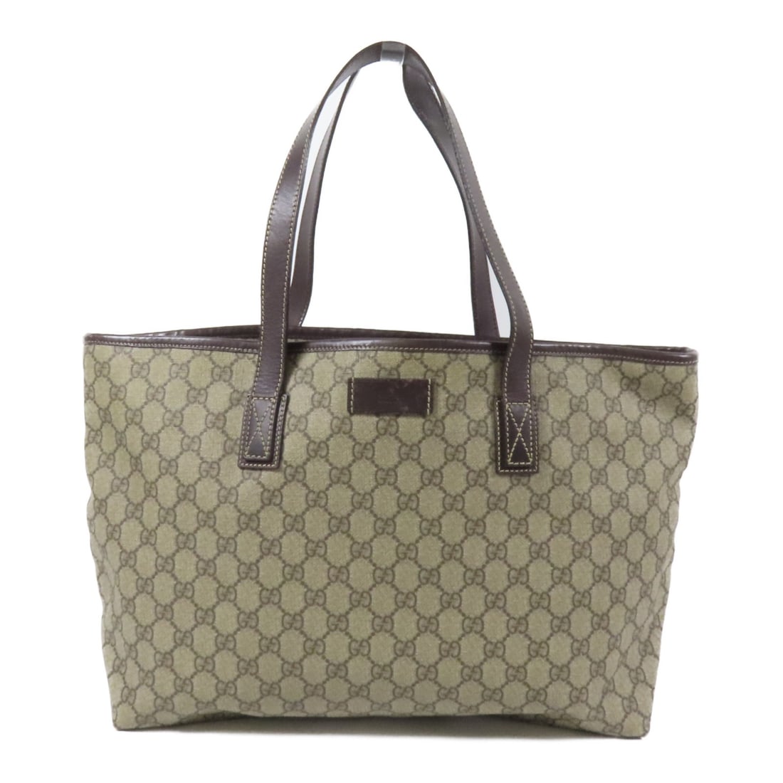 GUCCI GG Brown Coated Canvas Shoulder Bag Made in Italy: GUCCI GG Brown Coated Canvas Shoulder Bag Made in Italy This GUCCI GG Shoulder Bag is crafted from durable PVC coated canvas, featuring a sophisticated brown exterior that complements a variety of out