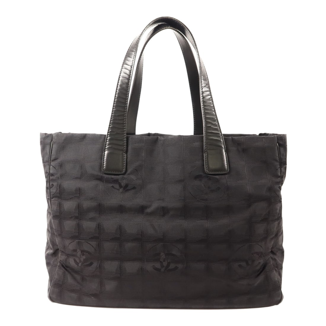 CHANEL Black Nylon Travel Line Tote with Gold Hardware: CHANEL Black Nylon Travel Line Tote with Gold Hardware This CHANEL CC Travel Line tote bag features a black nylon exterior and is designed for women. The bag is crafted in France and offers a spacious
