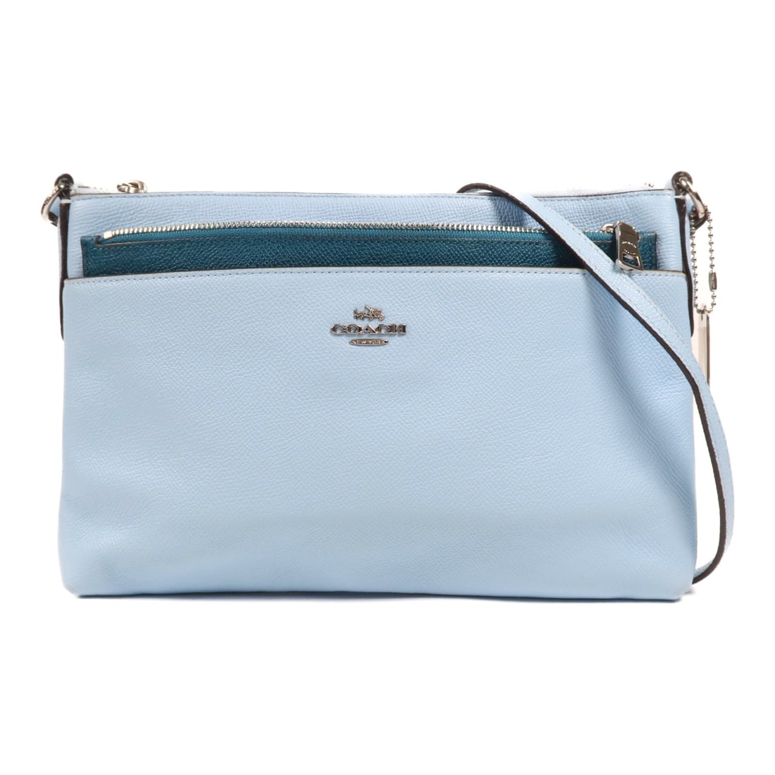 COACH Light Blue Calfskin Leather Shoulder Bag: COACH Light Blue Calfskin Leather Shoulder Bag This stylish COACH shoulder bag is crafted from high-quality calfskin leather in a light blue hue. Designed for both functionality and fashion, it featur