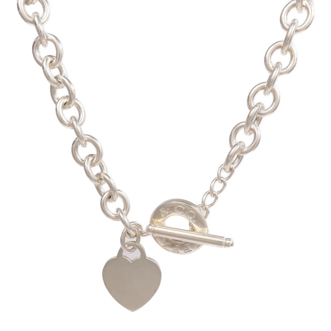 Tiffany Co Heart Tag Toggle 925 Sterling Silver Necklace: Tiffany Co Heart Tag Toggle 925 Sterling Silver Necklace This Tiffany & Co. Heart Tag Toggle Necklace is crafted from 925 sterling silver and features a classic heart tag design with a toggle clasp. D