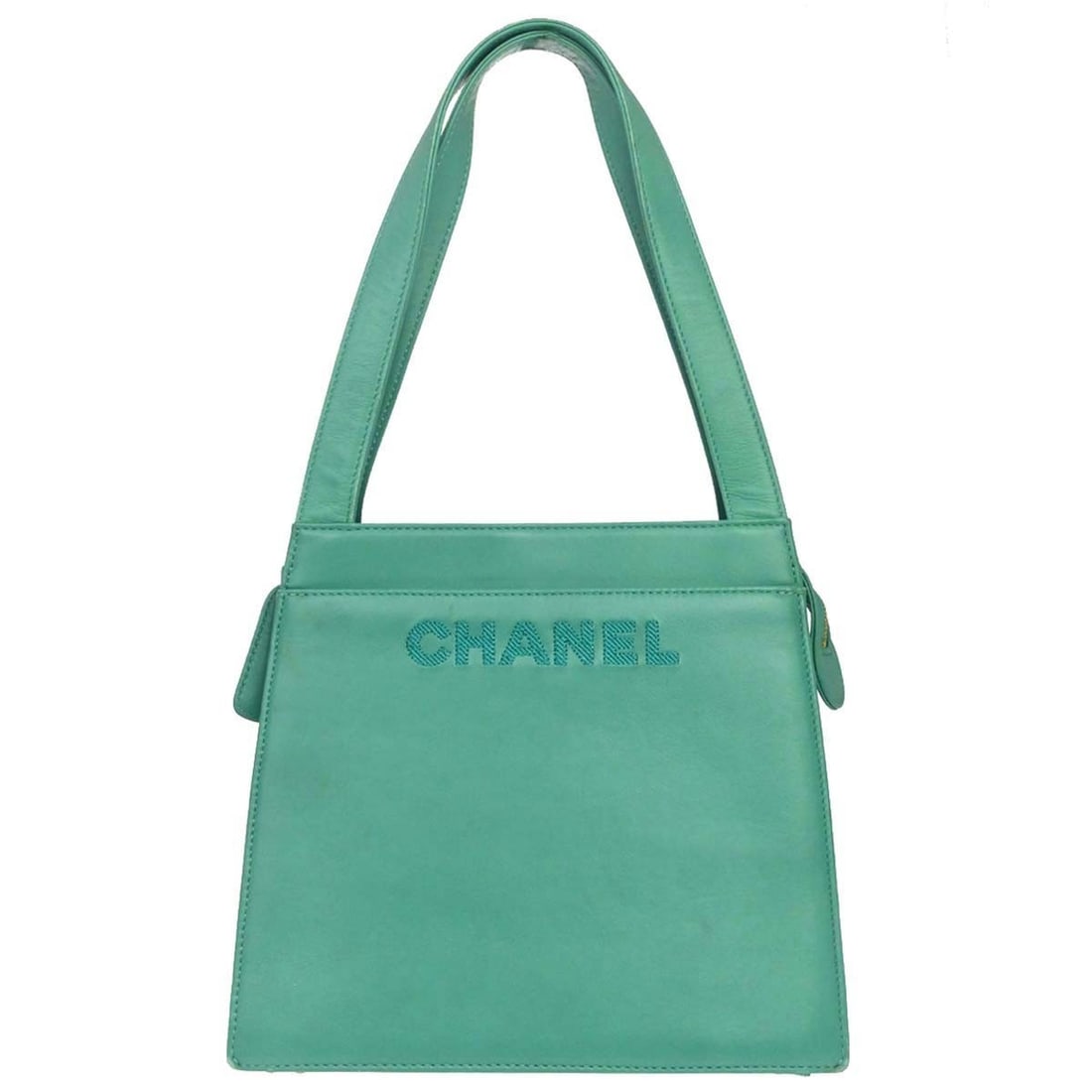 Chanel Medium Green Lambskin Leather Tote Bag with Double Handles: Chanel Medium Green Lambskin Leather Tote Bag with Double Handles This Chanel tote handbag is crafted from green lambskin leather and features double handles for easy carrying. Designed in a medium si