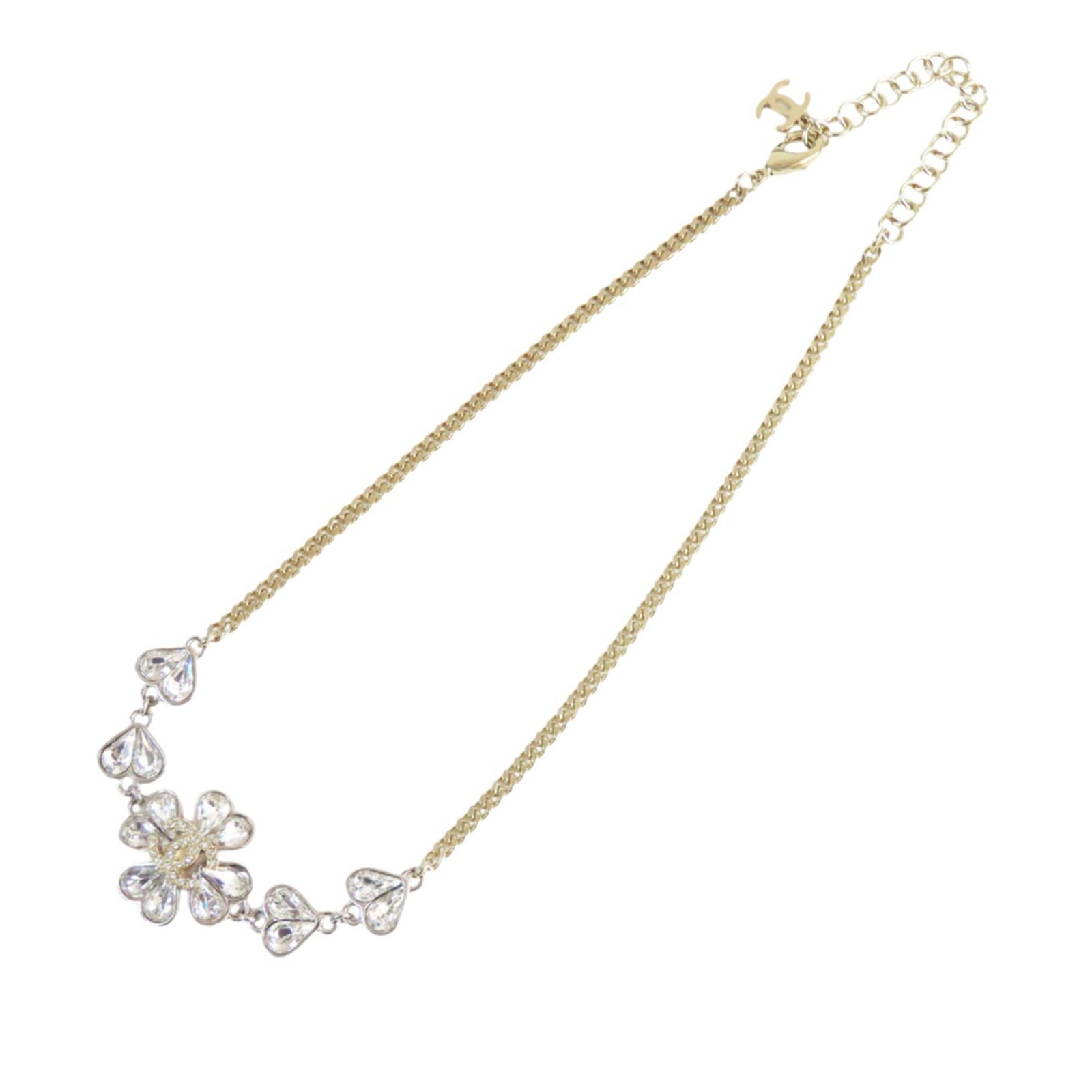 Chanel Heart and Clover Crystal Charm Pendant with Gold Plated Chain: Chanel Heart and Clover Crystal Charm Pendant with Gold Plated Chain This Chanel necklace features a gold plated chain adorned with crystal-embellished heart and clover charms. The necklace is secured