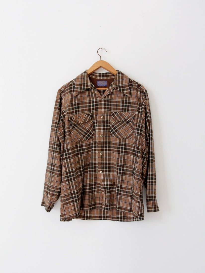 Pendleton Vintage Men's Plaid Flannel Shirt Pure Wool: Pendleton Vintage Men's Plaid Flannel Shirt Pure Wool This vintage men's plaid shirt by Pendleton features a stylish light brown, dark brown, and green plaid pattern. Crafted from pure virgin wool, th