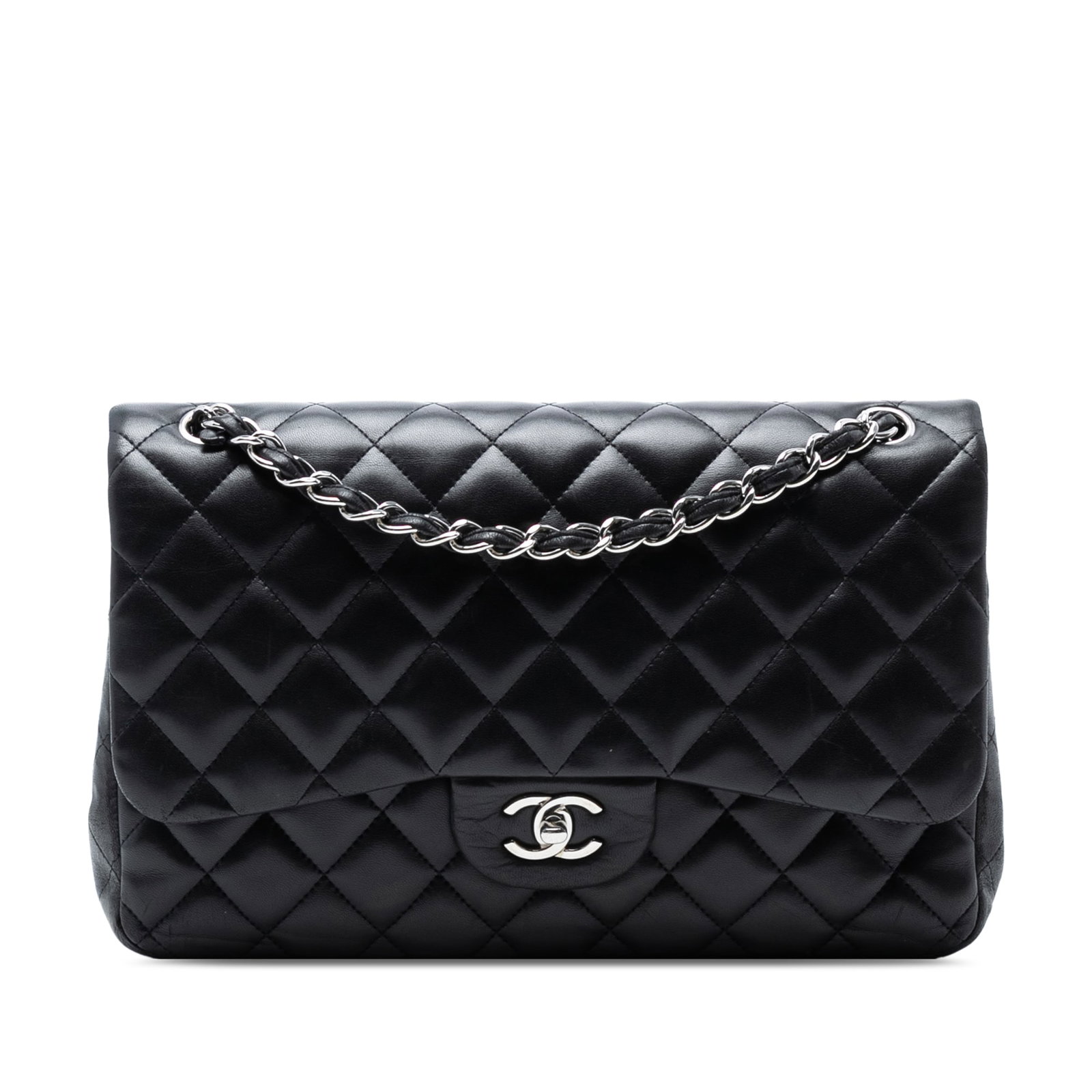 Chanel Jumbo Classic Black Lambskin Double Flap Shoulder Bag: Chanel Jumbo Classic Black Lambskin Double Flap Shoulder Bag This Chanel Jumbo Classic Lambskin Double Flap shoulder bag is an iconic accessory crafted from luxurious quilted lambskin leather. It show