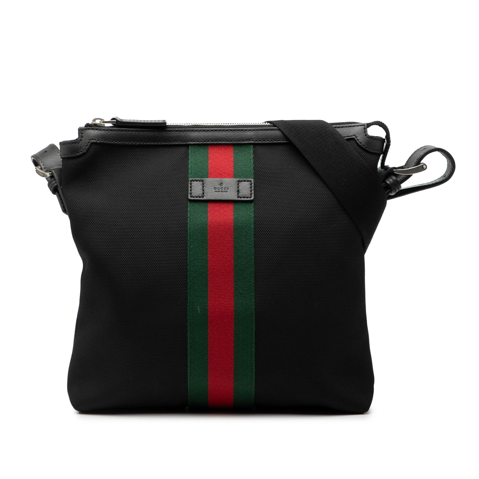 GG Techno Canvas Crossbody Bag with Web Detail by Gucci: GG Techno Canvas Crossbody Bag with Web Detail by Gucci This Gucci GG Techno Canvas Web Messenger Bag is crafted from durable canvas with leather trim and features the iconic web detail. The bag is de