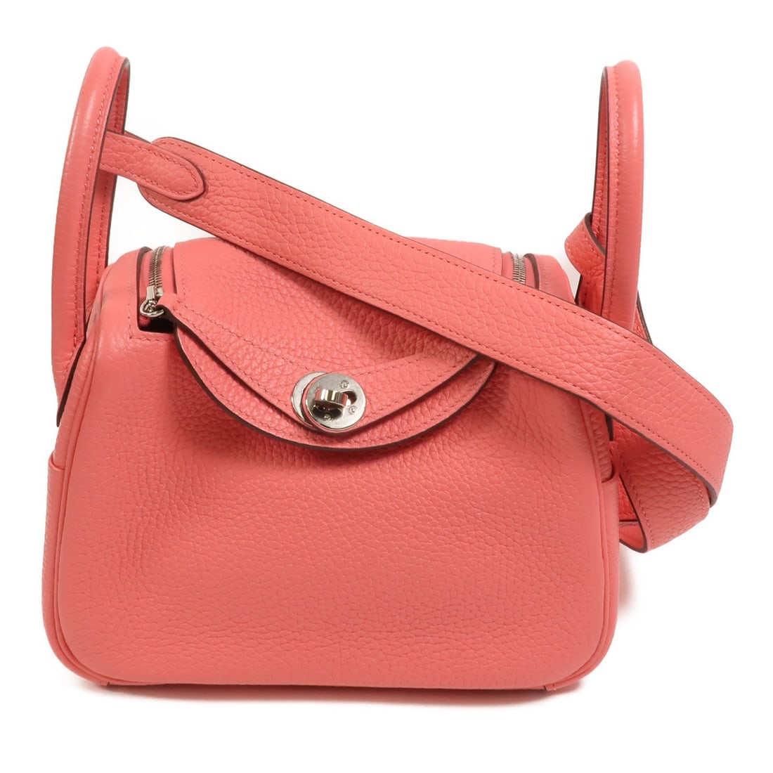 Hermes Mini Lindy Pink Taurillon Clemence 2 Way Shoulder Bag: Hermes Mini Lindy Pink Taurillon Clemence 2 Way Shoulder Bag This Hermes Mini Lindy 2-way shoulder bag is crafted from premium Taurillon Clemence calfskin leather in a vibrant Rose Azalee pink. Design