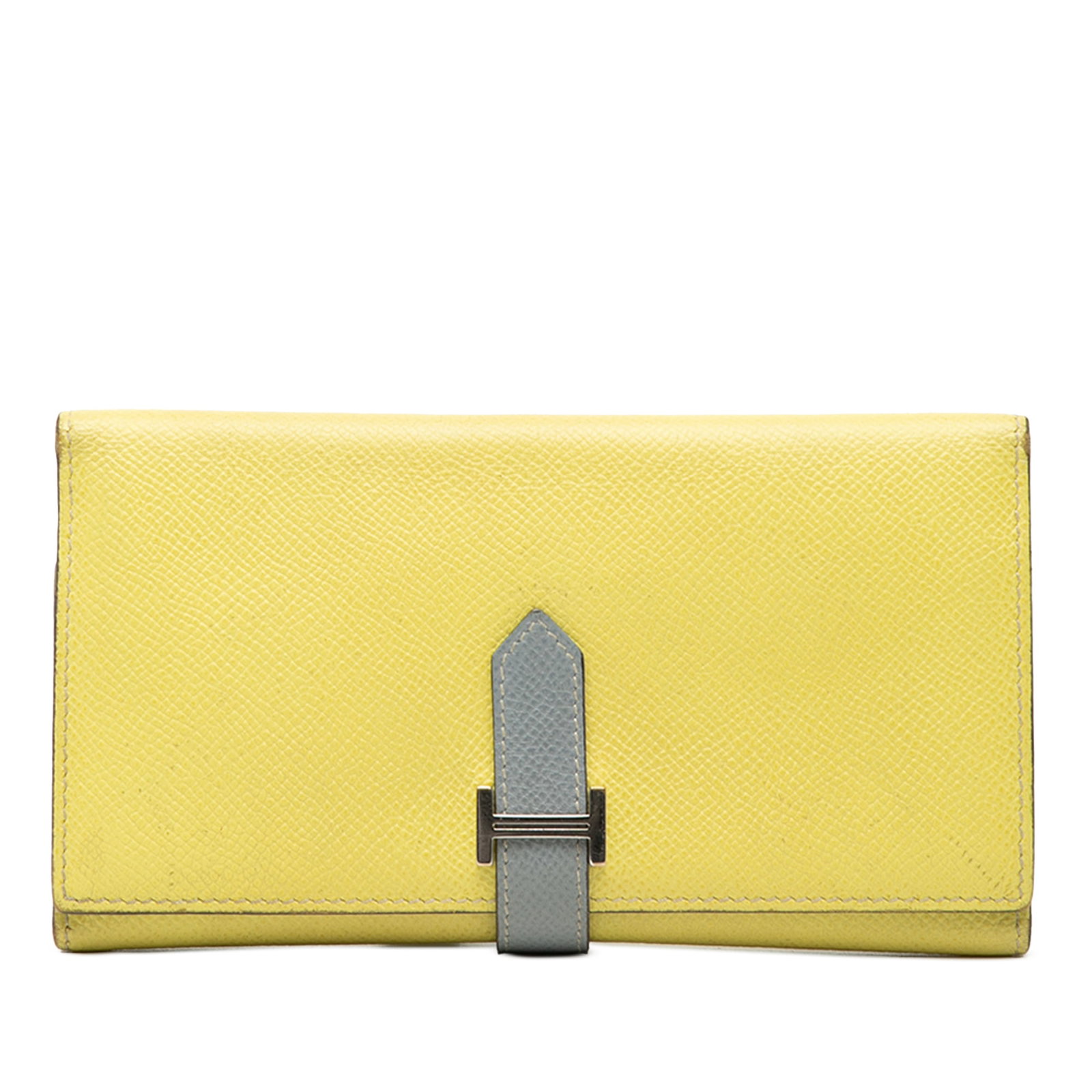 Epsom Leather Bearn Wallet in Yellow and Blue by Hermes: Epsom Leather Bearn Wallet in Yellow and Blue by Hermes This Hermes Bicolor Epsom Bearn Long Wallet is crafted from Epsom leather in Soufre and Blue Lin colors. It features a front pull-through strap 