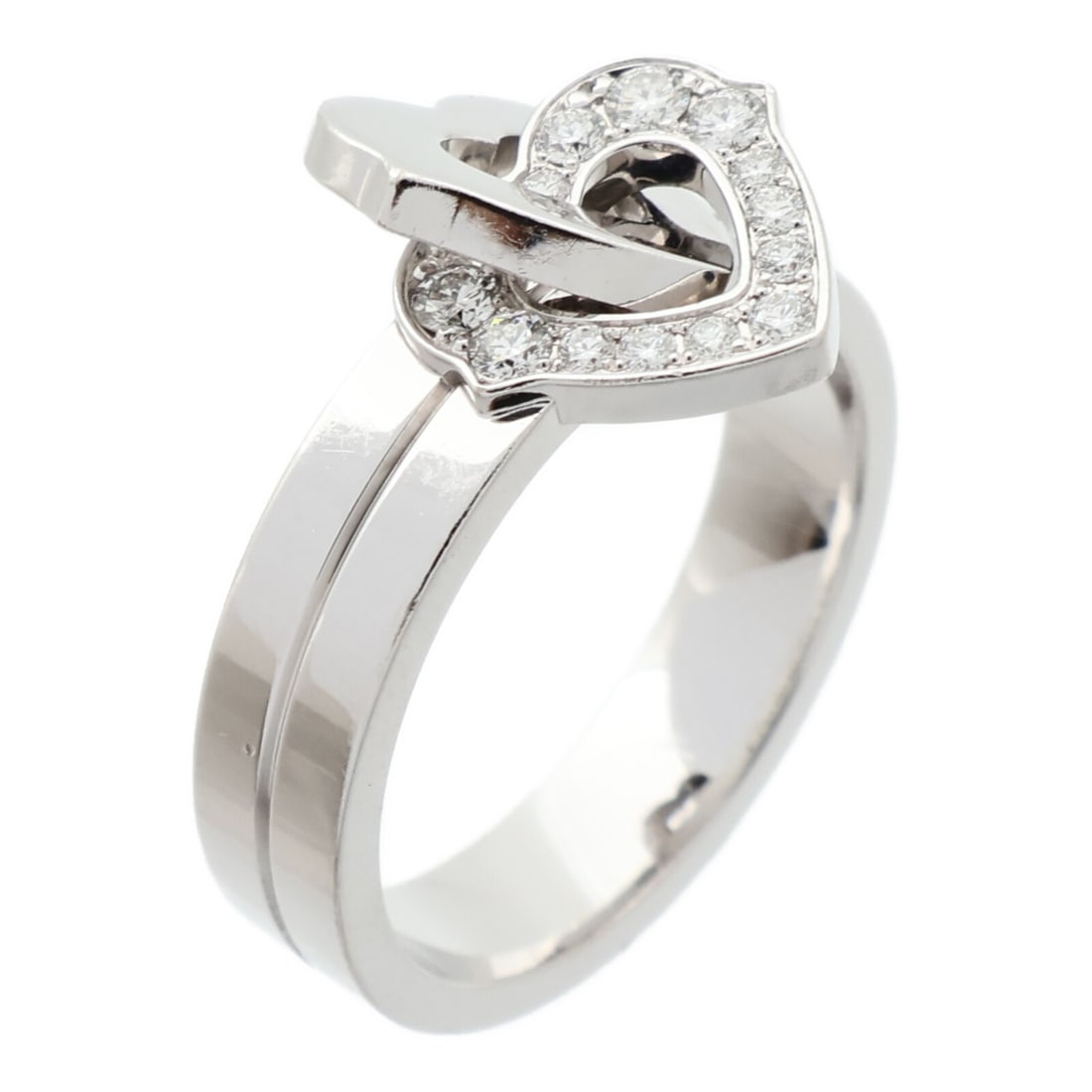 Cartier 18K White Gold Double Heart Diamond Ring Size 6.25: Cartier 18K White Gold Double Heart Diamond Ring Size 6.25 This Cartier Double Heart Ring is crafted from 18K white gold and features a delicate design with a diamond accent. Designed for women, it is