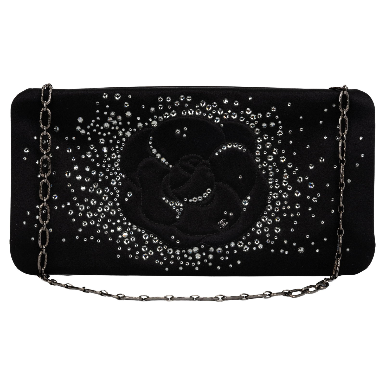 Chanel Black Satin Clutch Spring/Summer 2010 with Crystal Embellishments: Chanel Black Satin Clutch Spring/Summer 2010 with Crystal Embellishments This elegant Chanel Black Satin Strass Camellia Clutch is a stunning accessory from the Spring/Summer 2010 Collection by Karl L