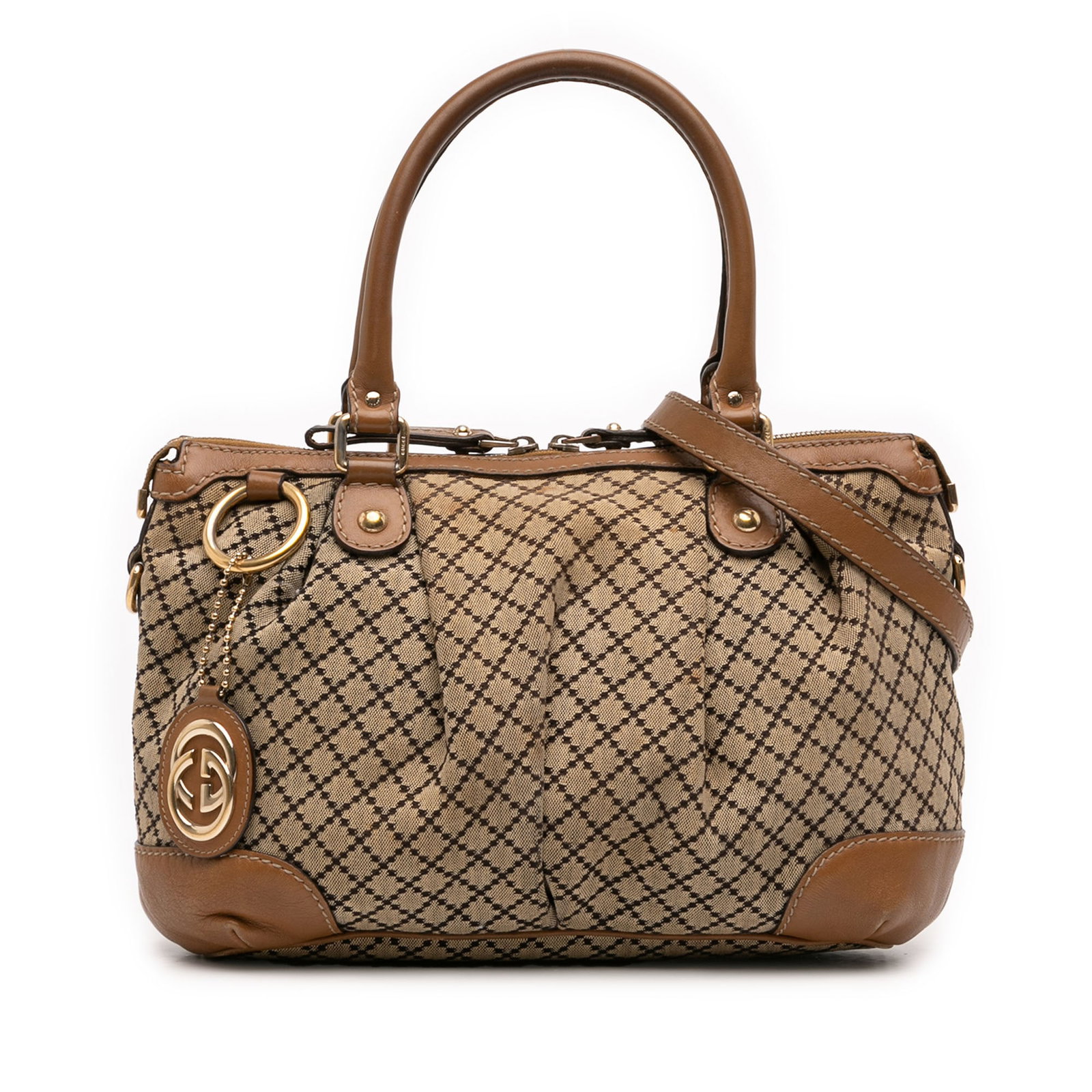Gucci Sukey Beige Diamante Canvas Satchel with Leather Trim and Strap: Gucci Sukey Beige Diamante Canvas Satchel with Leather Trim and Strap The Gucci Diamante Canvas Sukey Satchel features a beige canvas body with leather trim, rolled leather handles, a detachable flat 