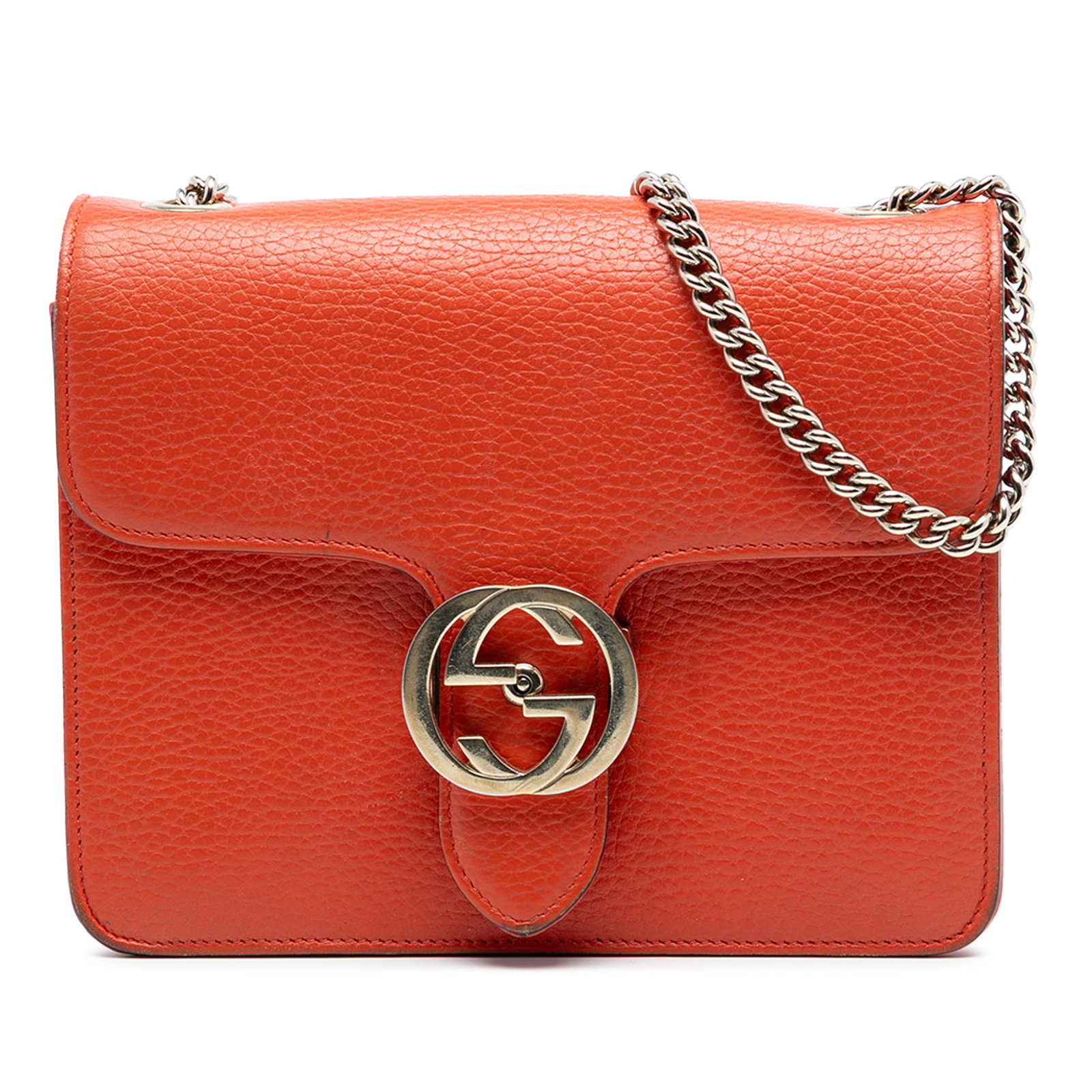 Gucci Interlocking G Small Orange Leather Crossbody Bag: Gucci Interlocking G Small Orange Leather Crossbody Bag This crossbody bag is crafted from leather and features a chain-link shoulder strap with a leather shoulder guard. It has a front flap with a si