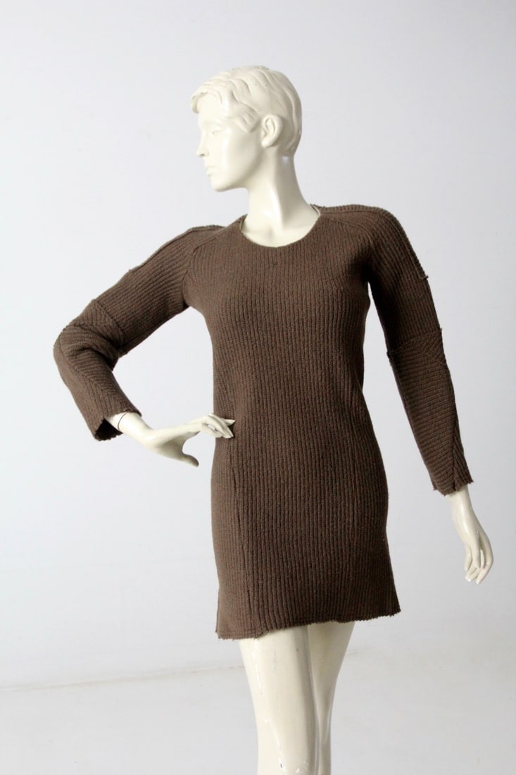Etoile Isabel Marant Vintage Brown Knit Mini Dress: Etoile Isabel Marant Vintage Brown Knit Mini Dress This vintage Etoile Isabel Marant mini dress showcases a chic brown ribbed knit design that embodies timeless French fashion. Crafted from a soft rib