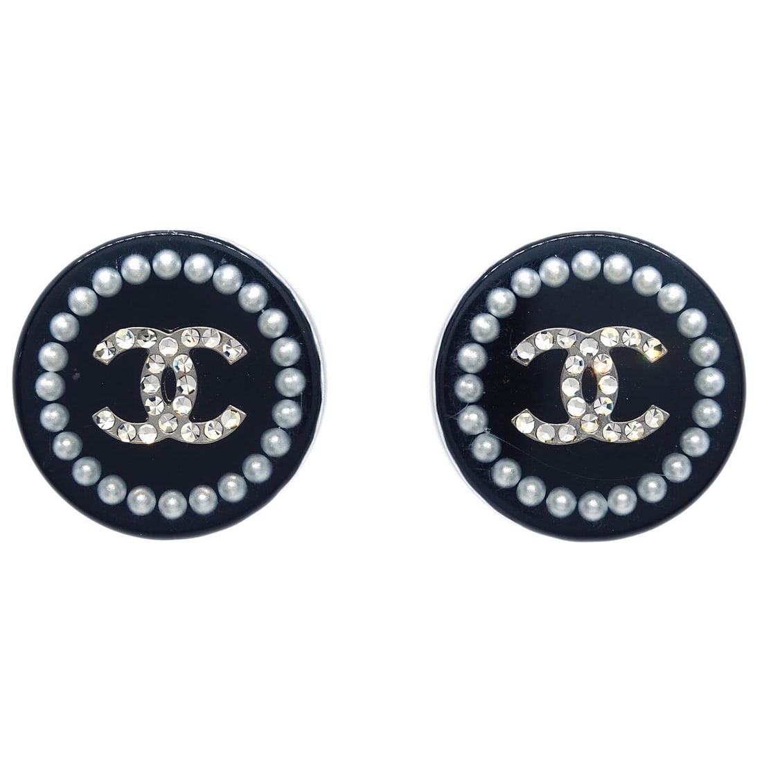 Chanel Black Button Piercing Earrings with Rhinestone and Pearl: Chanel Black Button Piercing Earrings with Rhinestone and Pearl Elevate your accessory collection with these exquisite Chanel Button Piercing Earrings. Designed with a striking black color, these earr