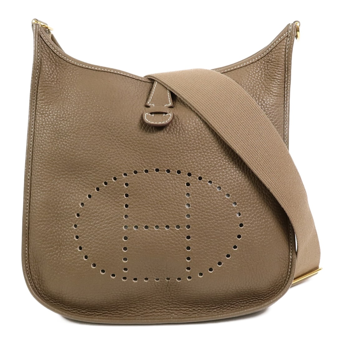 Hermes Evelyne PM Etoupe Taurillon Clemence Shoulder Bag GHW: Hermes Evelyne PM Etoupe Taurillon Clemence Shoulder Bag GHW This Hermes Evelyne PM shoulder bag is crafted from Taurillon Clemence calfskin leather in a brown shade. It features a classic and versati