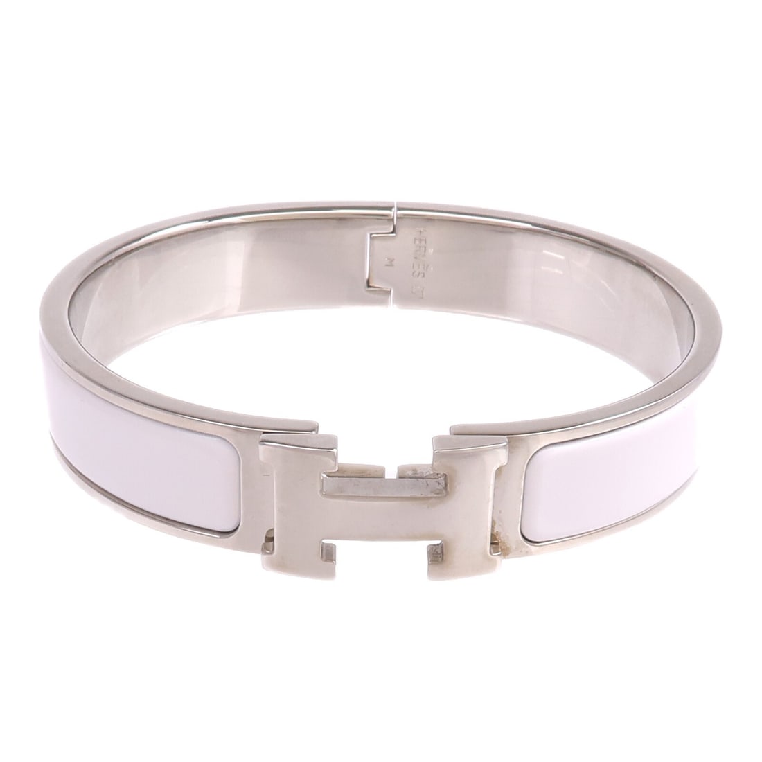 Hermes White Enamel Clic H Silver Tone Women's Bracelet: Hermes White Enamel Clic H Silver Tone Women's Bracelet This Hermes Clic H bracelet features white enamel and metal accents, designed for women. It showcases a classic style with no main stone and is 