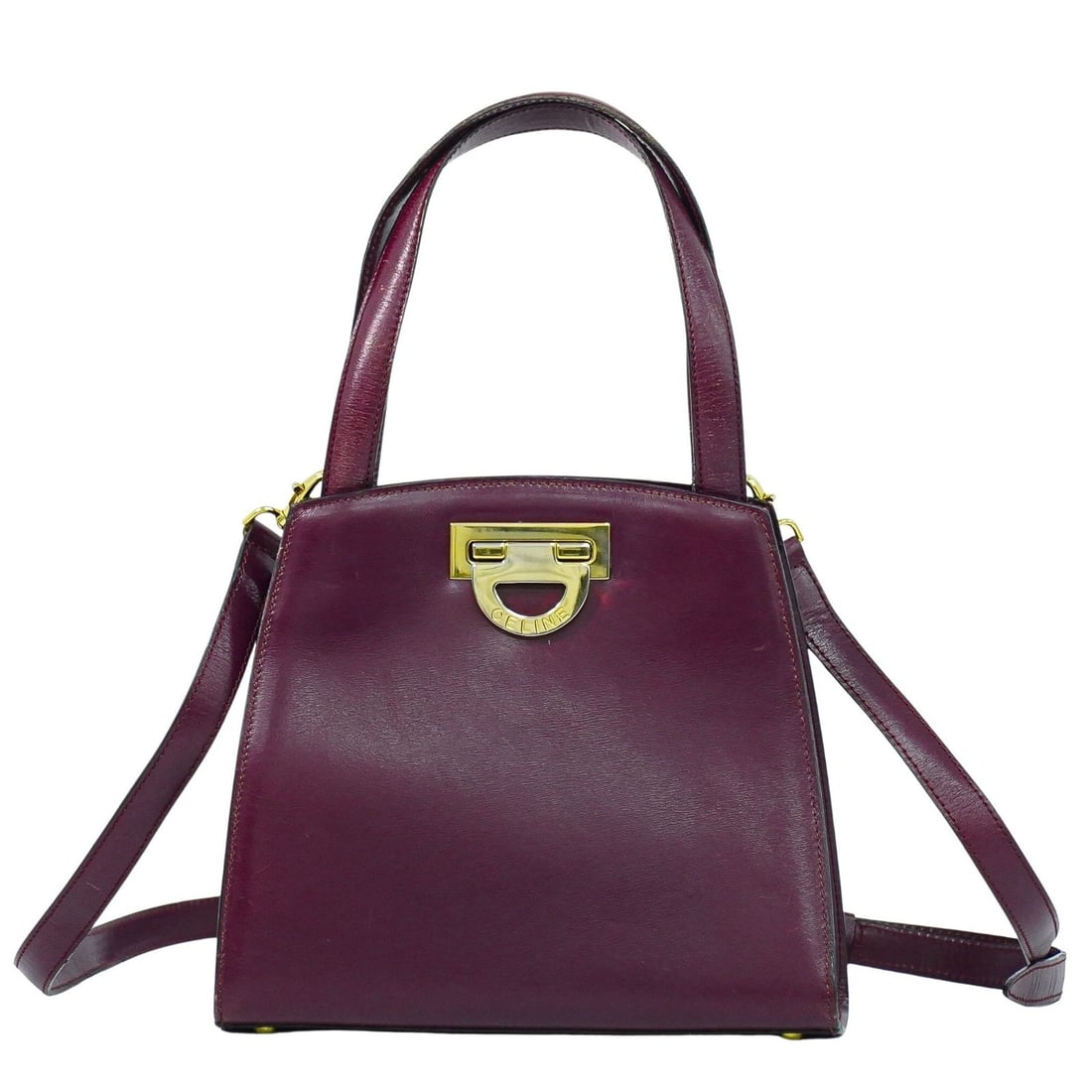 Celine Purple Leather Women's Handbag Made in Italy: Celine Purple Leather Women's Handbag Made in Italy This Celine handbag is crafted from purple leather and designed for women. Made in Italy, it features a spacious interior with a zipper pocket. The 