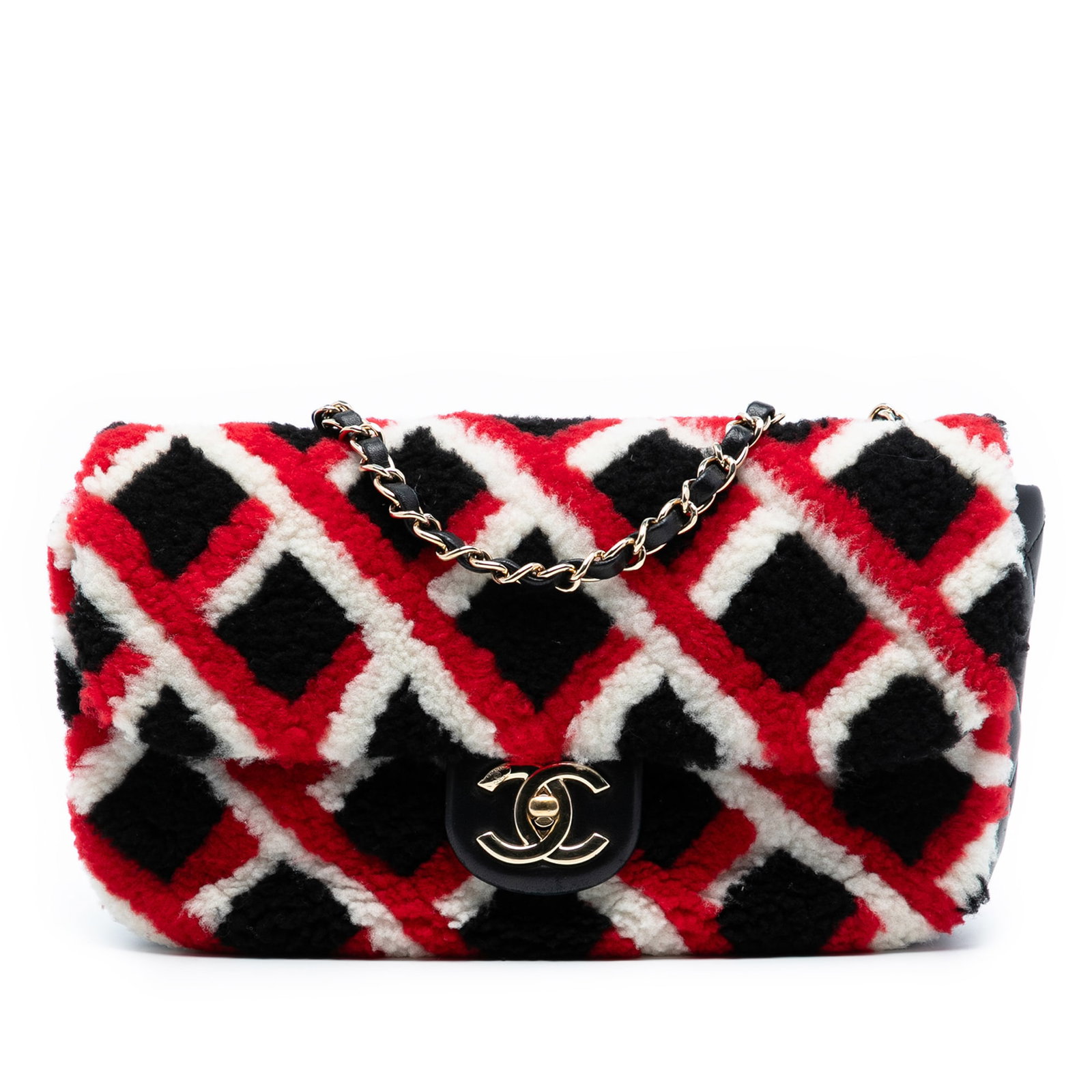 Chanel Black Shearling Lambskin Medium Flap Bag with CC Turn Lock: Chanel Black Shearling Lambskin Medium Flap Bag with CC Turn Lock This Chanel Medium CC Shearling and Lambskin Single Flap bag features a black shearling body with lambskin leather trim, complemented 