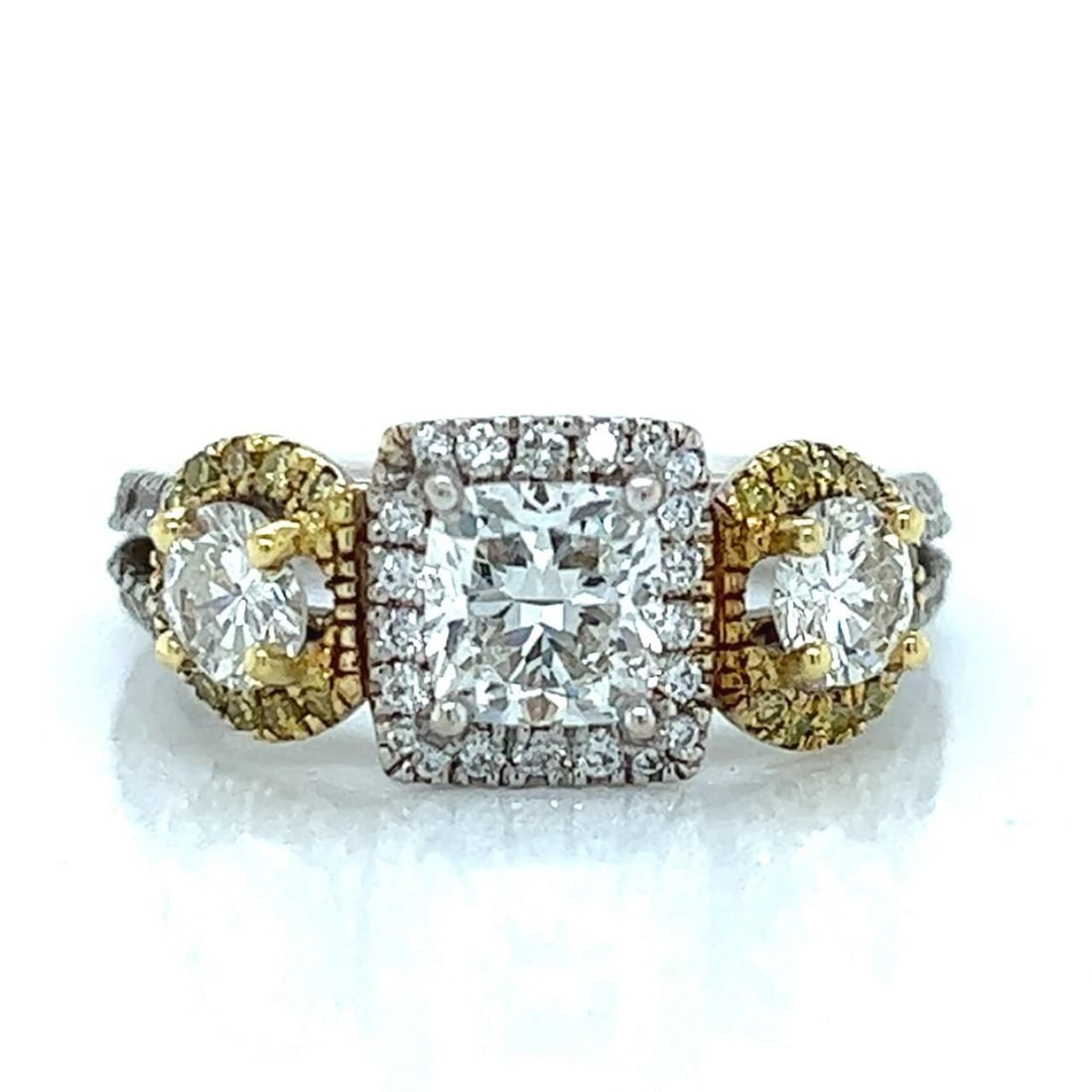 GIA Certified 18K White Yellow Gold Diamond Ring 1.01 Ct Cushion Cut: GIA Certified 18K White Yellow Gold Diamond Ring 1.01 Ct Cushion Cut This stunning 18K White and Yellow Gold ring features a GIA Certified 1.01 Ct. cushion-cut diamond, boasting I color and VS1 clarit