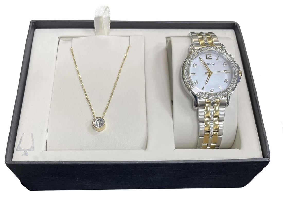 Bulova 98X127 Ladies 34mm Two-Tone Watch with Crystal Necklace Set: Bulova 98X127 Ladies 34mm Two-Tone Watch with Crystal Necklace Set This Bulova ladies' set features a two-tone 34mm stainless steel wristwatch paired with a crystal stud necklace. The watch showcases 