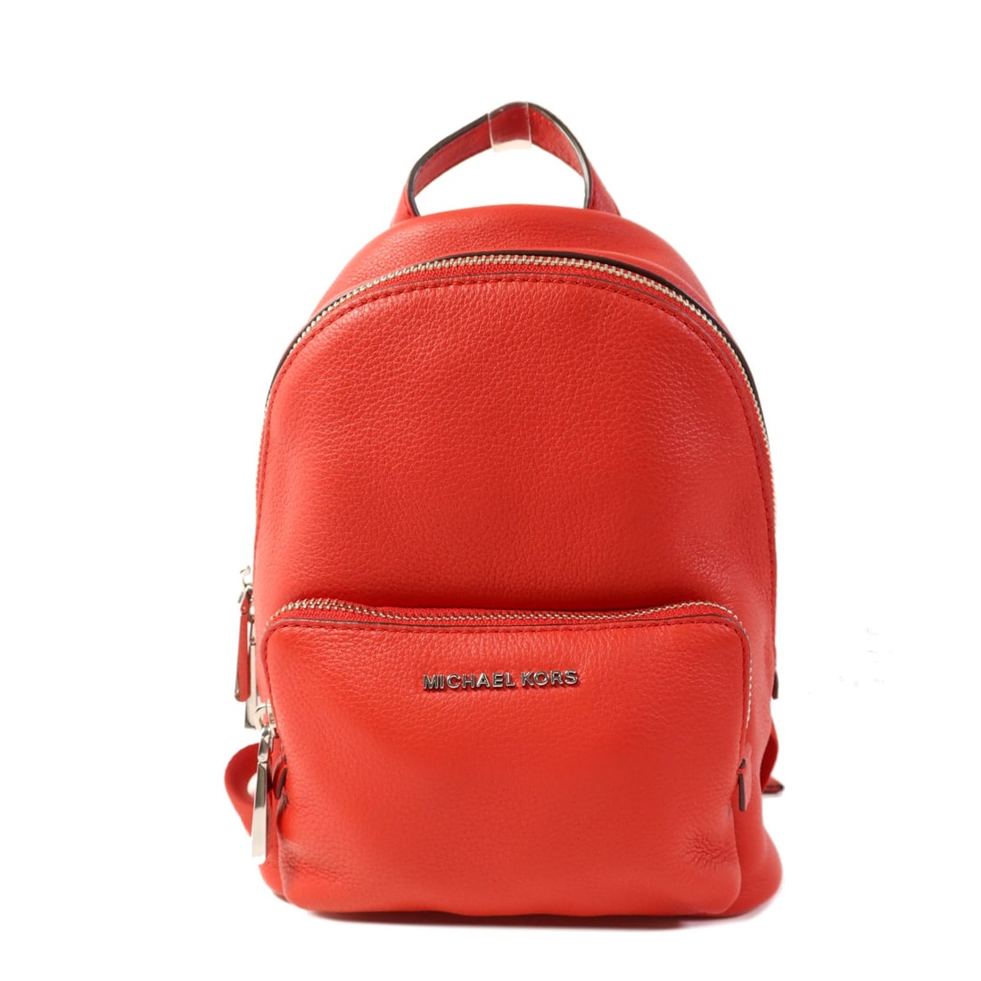 Michael Kors Red Calfskin Leather Rucksack Backpack: Michael Kors Red Calfskin Leather Rucksack Backpack This striking Michael Kors rucksack backpack is crafted from high-quality calfskin leather in a vibrant red hue. The stylish design features a compa