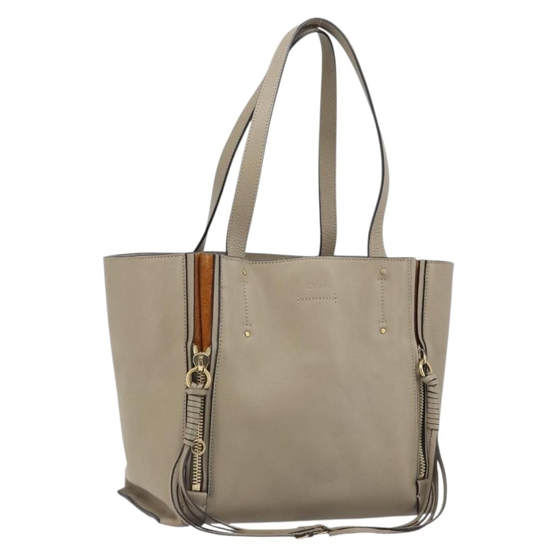 Chloe Milo Leather Tote in Beige and Gold with Dust Bag: Chloe Milo Leather Tote in Beige and Gold with Dust Bag This Chloe Milo tote bag is crafted from beige and gold leather and designed for women. The bag features a spacious interior, sturdy handles, an