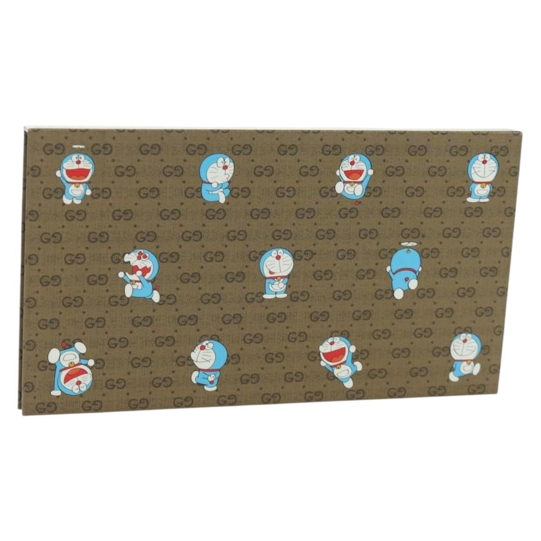 Doraemon Collaboration Beige PVC Planner by Gucci GG Supreme: Doraemon Collaboration Beige PVC Planner by Gucci GG Supreme This is a Gucci GG Supreme Doraemon collaboration planner crafted from beige PVC leather and GG canvas. Designed for women, it features a s