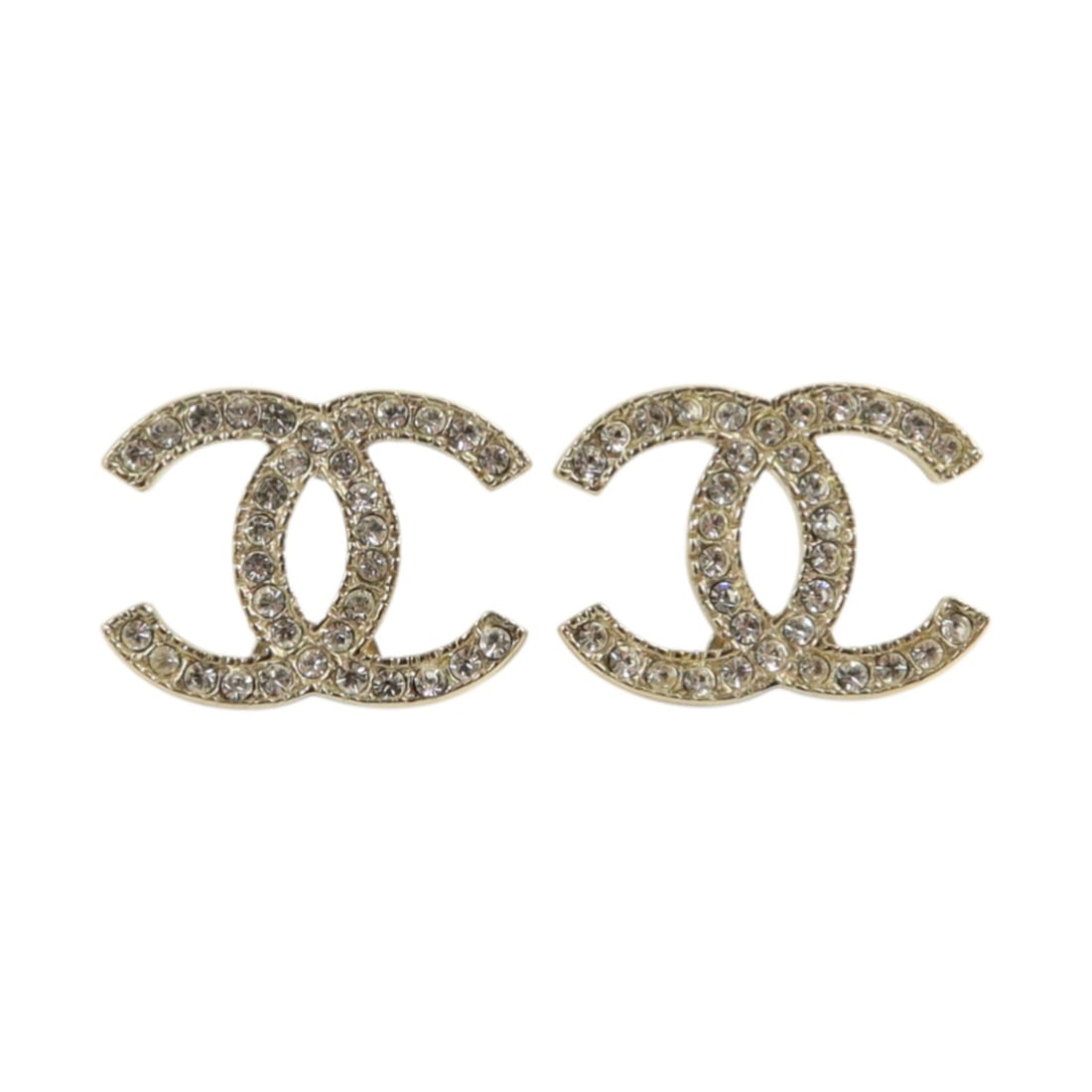 Gold Tone Pierced Earrings with CC Logo by CHANEL: Gold Tone Pierced Earrings with CC Logo by CHANEL These CHANEL CC pierced earrings feature a gold tone finish and the iconic CC logo design. Made in France, they are crafted for women and do not inclu