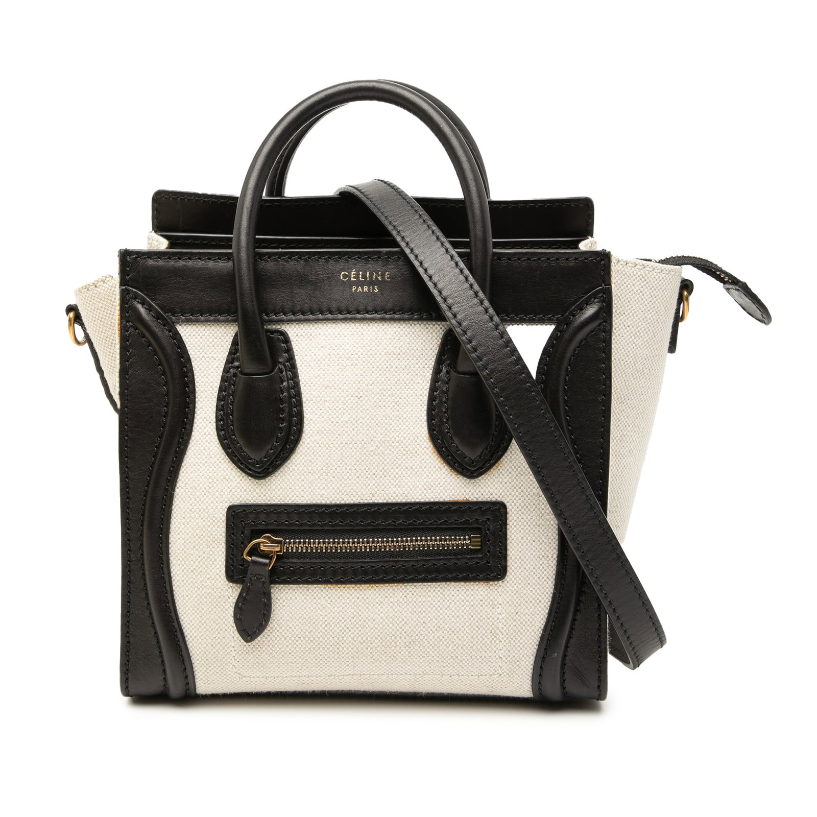 Nano Luggage Tote in Canvas and Leather by Celine Bicolor: Nano Luggage Tote in Canvas and Leather by Celine Bicolor This Celine Nano Bicolor Luggage Tote features a canvas and leather body, rolled leather handles, a detachable flat shoulder strap, a top zip 