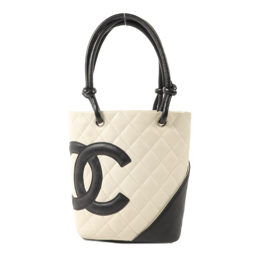 CHANEL Cambon White Black Calfskin Tote Bag: CHANEL Cambon White Black Calfskin Tote Bag This CHANEL Cambon tote bag is crafted from calfskin leather in a striking white and black color combination. Designed with the iconic CC logo, it features 