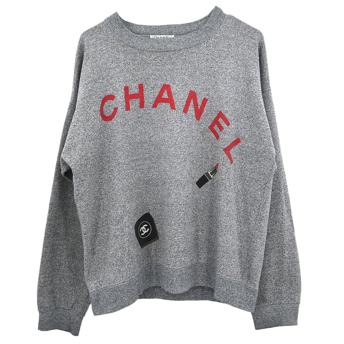 Gray Chanel Casual Long Sleeve Knit Top: Gray Chanel Casual Long Sleeve Knit Top This gray Chanel long sleeve top features a regular fit and is designed for casual occasions. The material is unspecified, and the item is not vintage. It is in